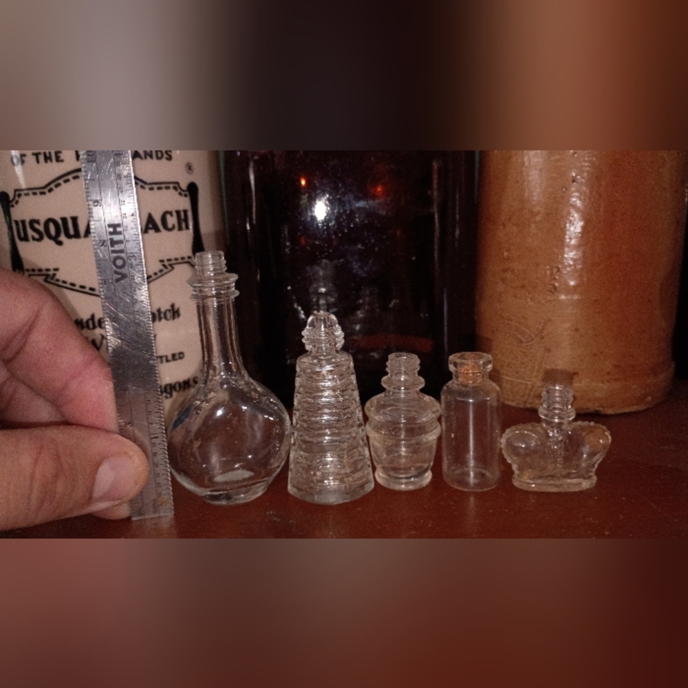 Set of Vintage Clear Glass Bottles